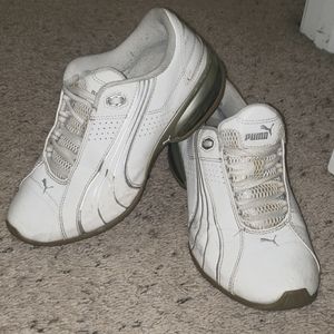 White leather Puma tennis shoes